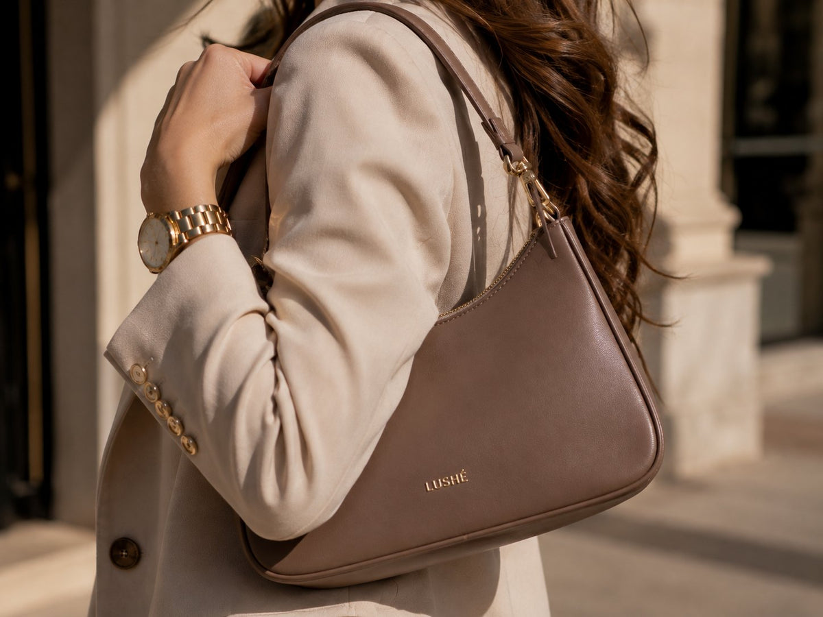 A LUSHÉ shoulder bag worn on the street